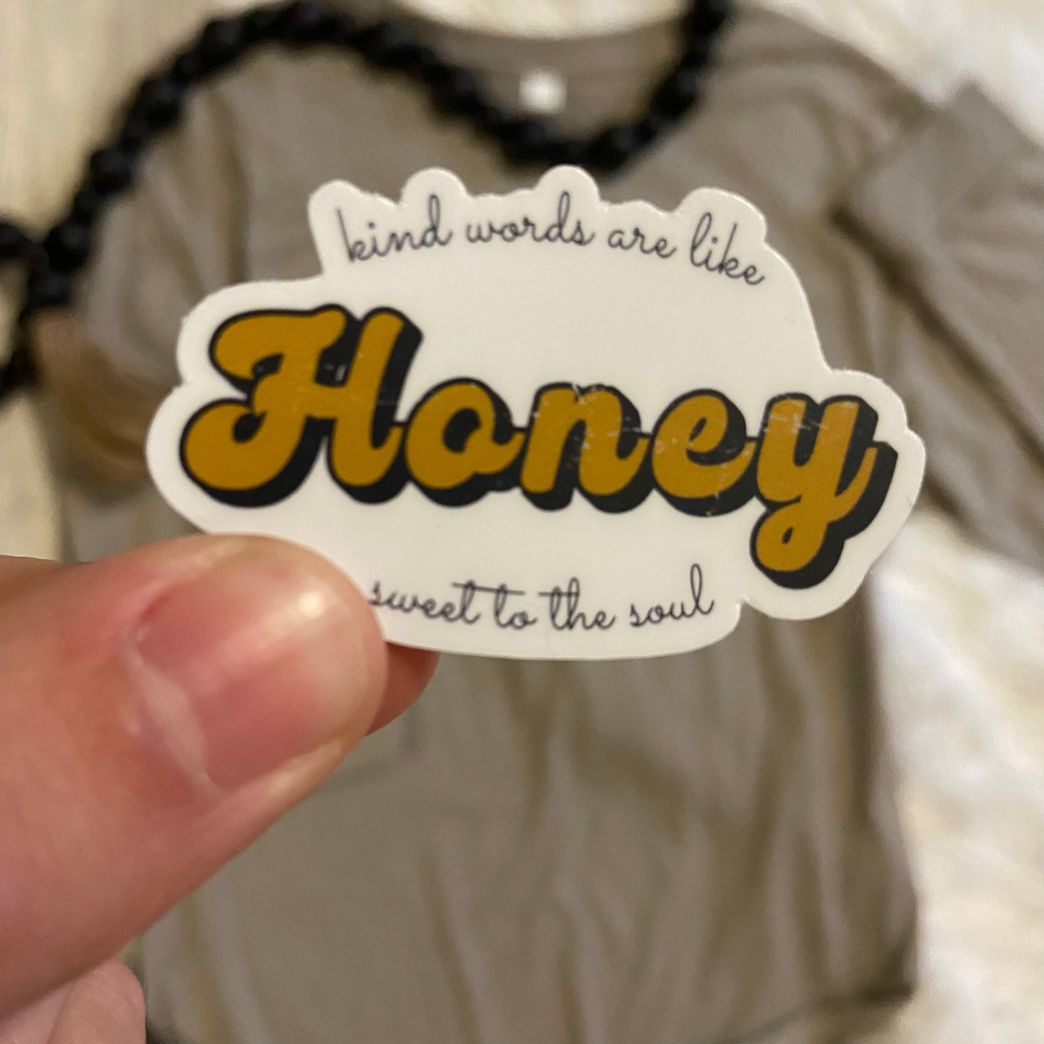 Kind words are like honey, sweet to the soul text on a sticker