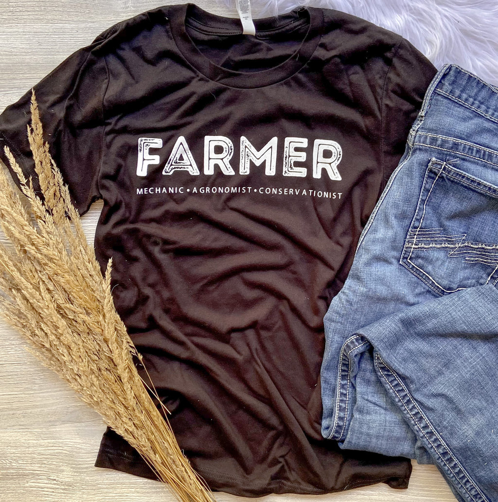 Black farmer t shirt that says mechanic, agronomist, conservationist